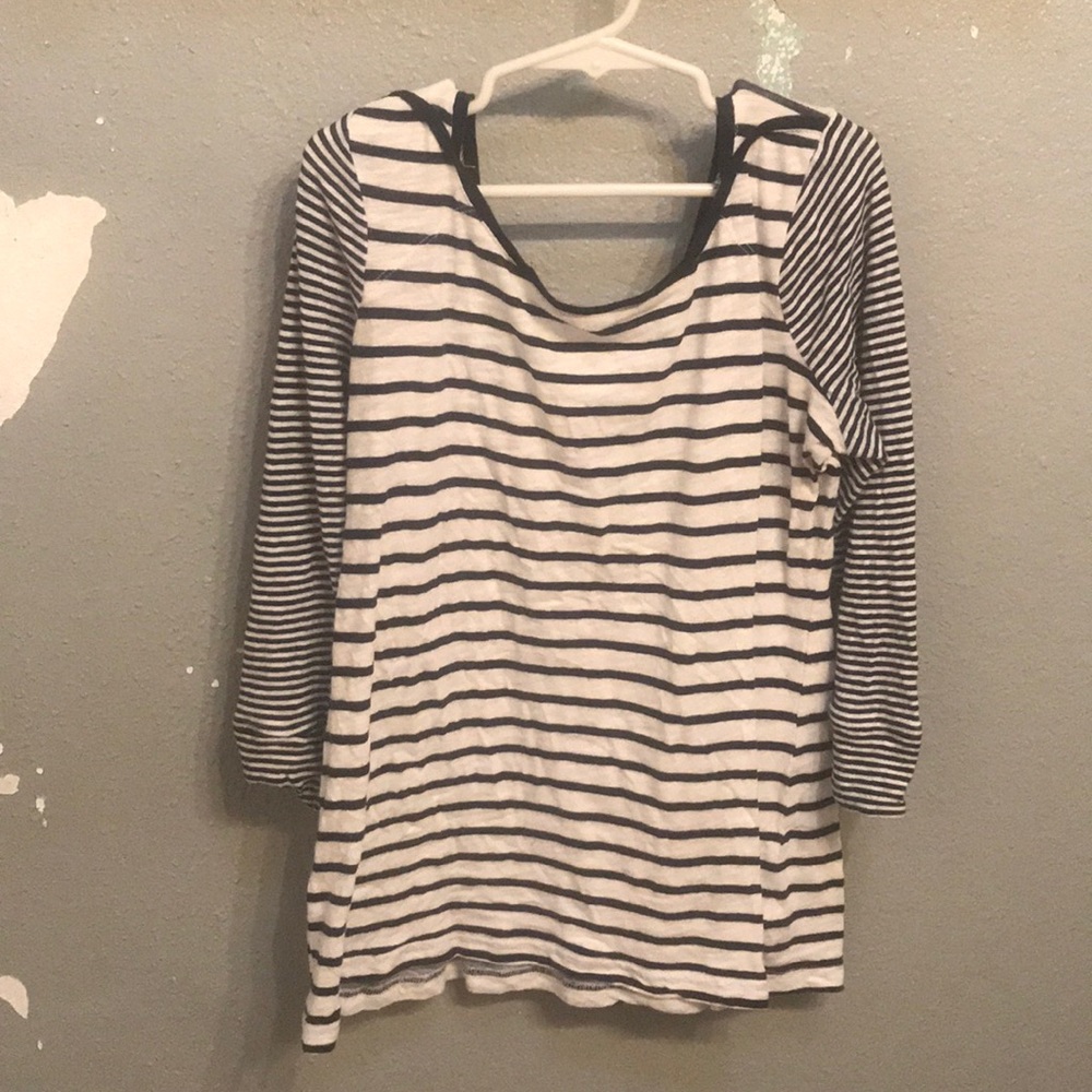 a 3/4 striped sleeve shirt